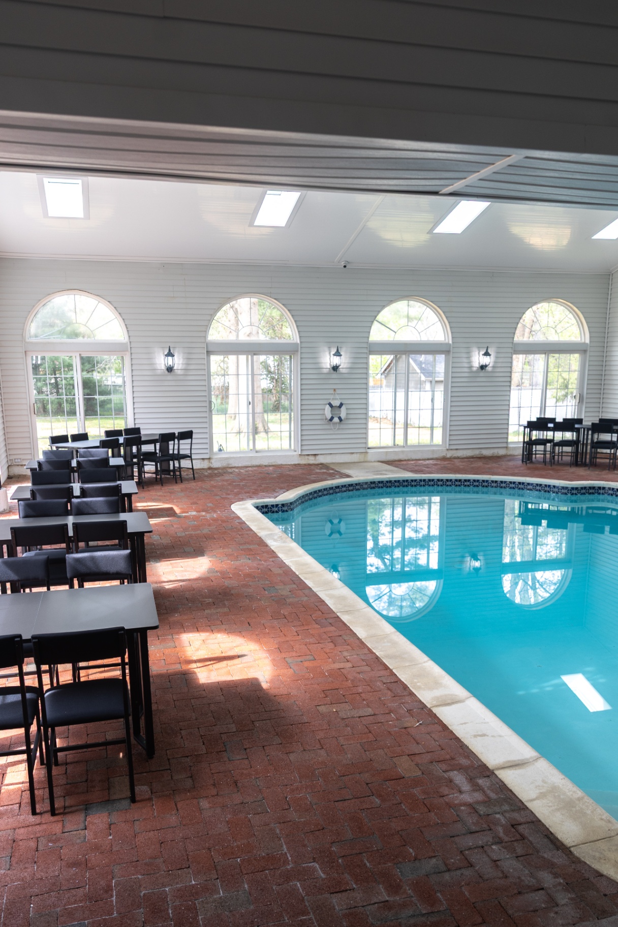 Vertical view of the indoor pool with natural light