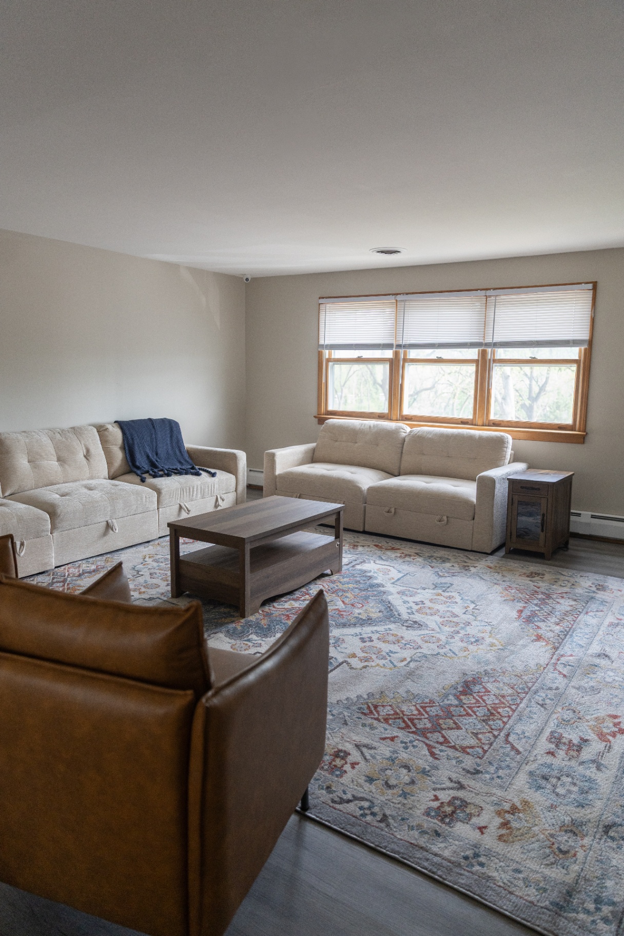 Shared lounge seating with patterned rug