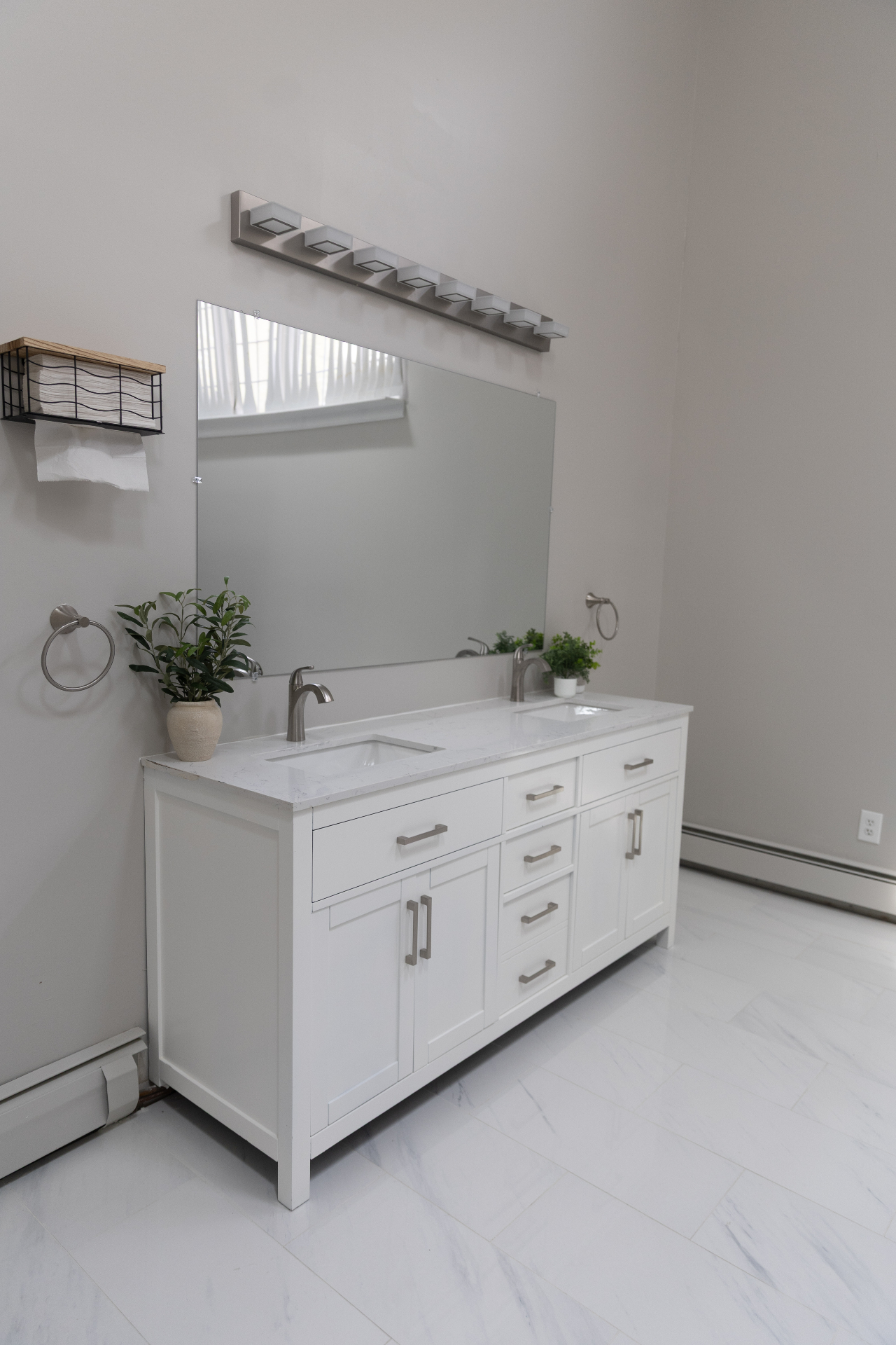 Wide view of the double vanity bathroom